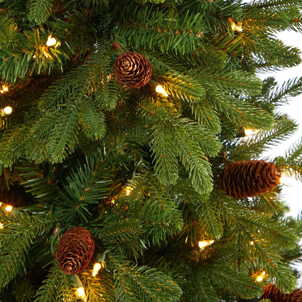 4’ Yukon Mountain Fir Artificial Christmas Tree with 100 Clear Lights, Pine Cones and 386 Bendable Branches in Country White Planter